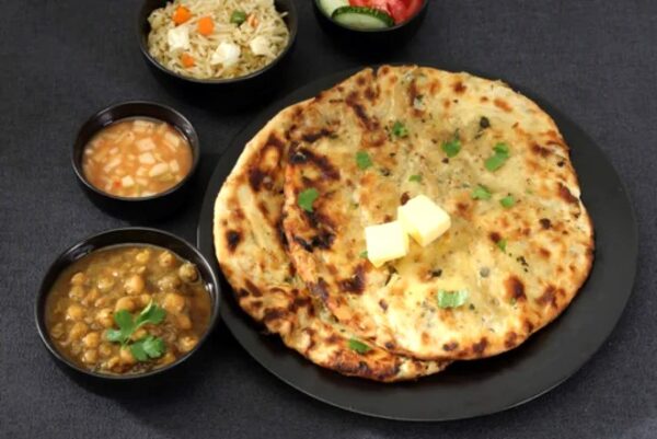 Loaded Desi Tawa (2 Desi Pratha + Double Omelette + Chana + Aalo + Tarka Daal + Suji Halwa)